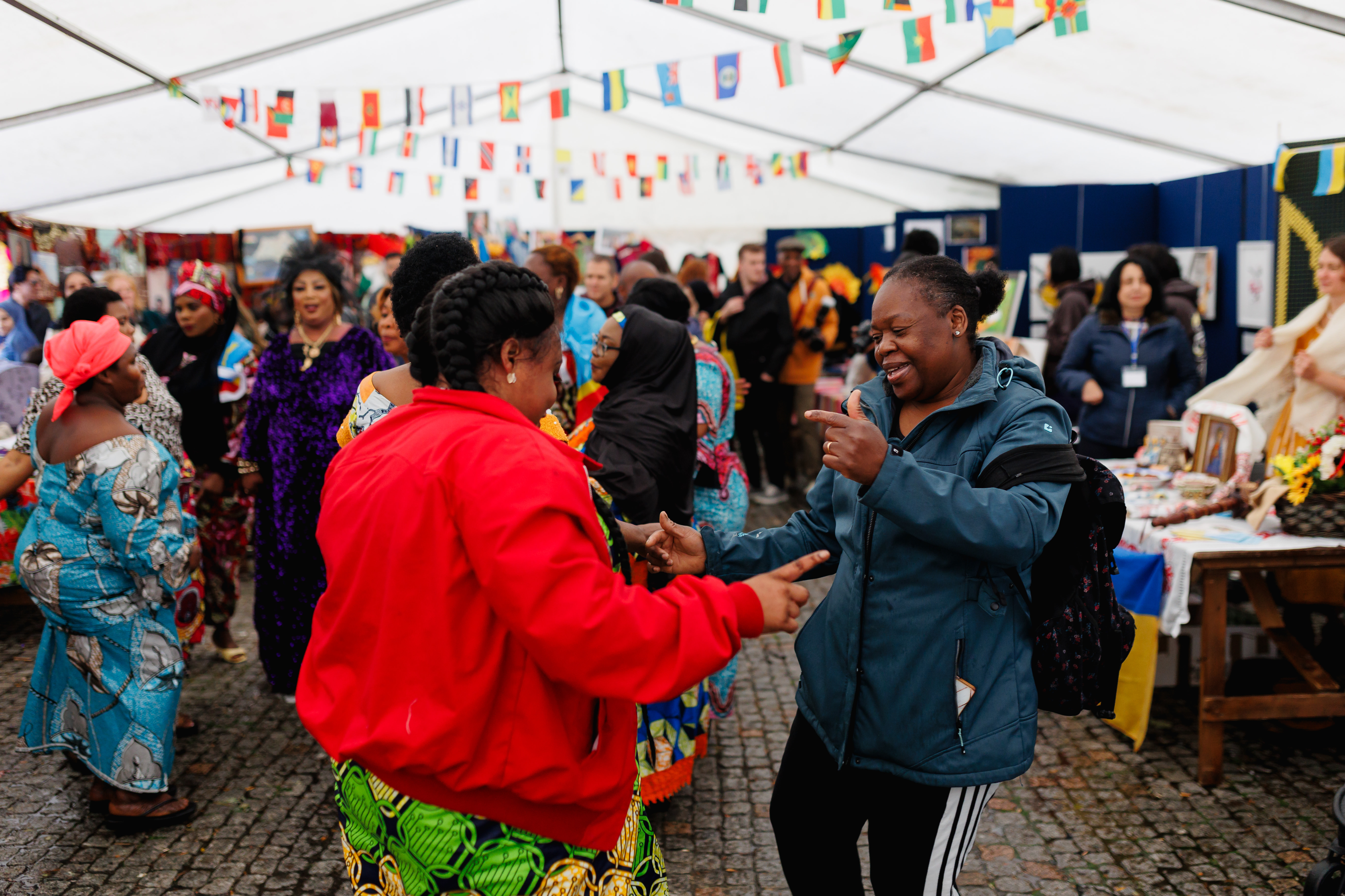 Crowds of festival goers enjoying the global village