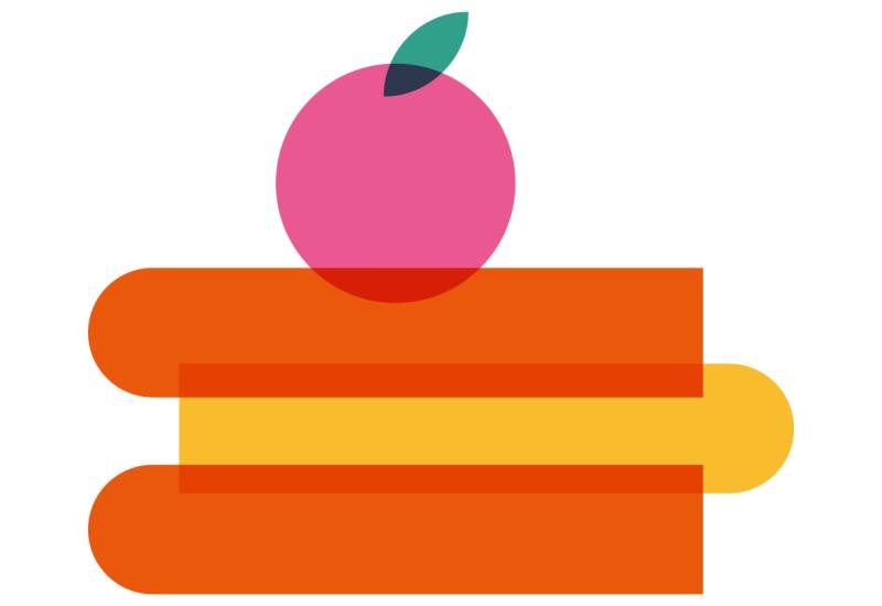Pile of books with apple on top