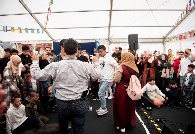 Crowds getting involved in the global village at the Yorkshire Integration Festival 2022