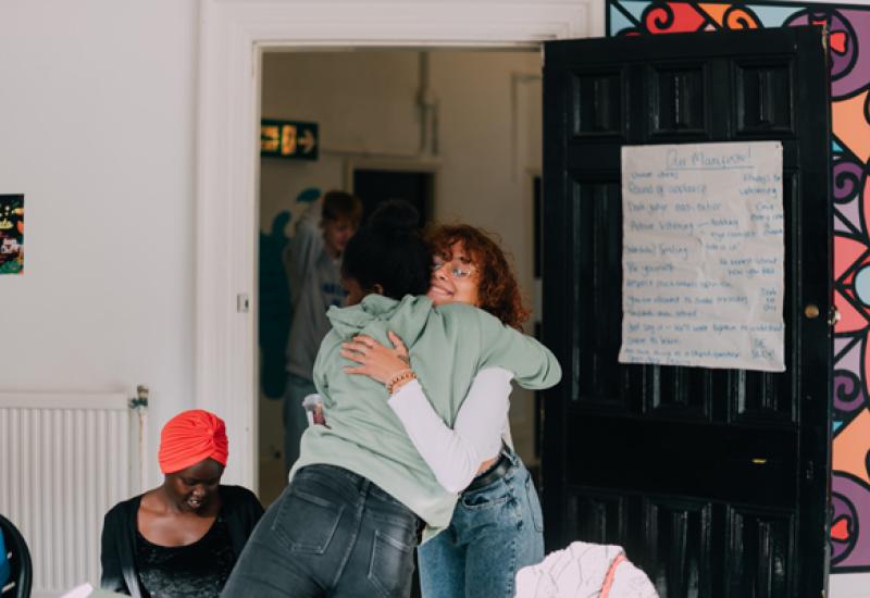 Two women hugging
