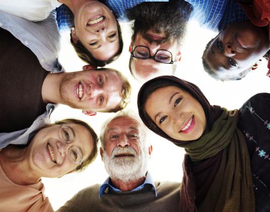 Group of people from all nationalities and ethnicities promoting diversity