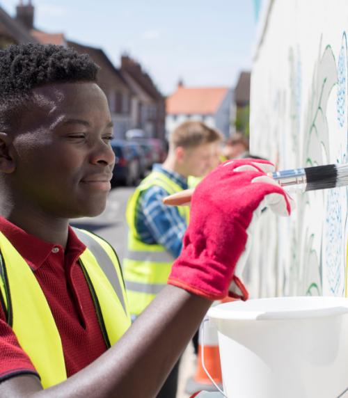 A person taking part in a community art project